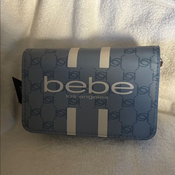 bebe Handbags - Bebe Sky Blue Clutch with Gold Accents
